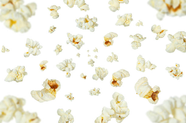 istock Collection of tasty popcorn falling isolated on white background. Selective focus 1460563471