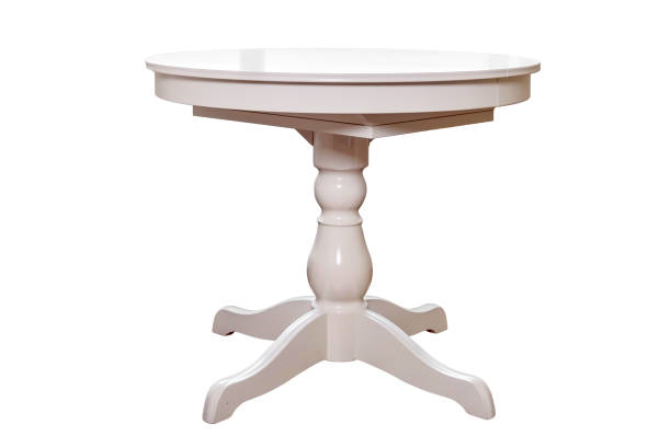 istock Round white table in retro style, isolated on a white background, isolated on a white background. Vintage dining round table, close-up 1460567211