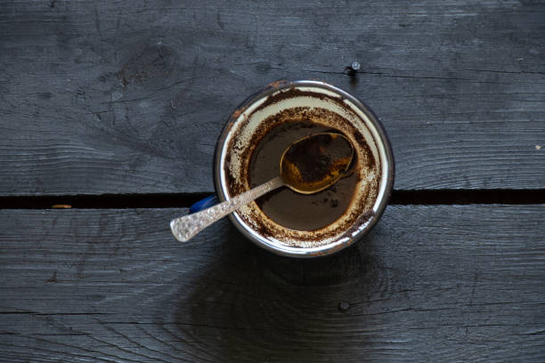 istock blue cup with white peas on an old wooden table, a cup with coffee i 1460568217
