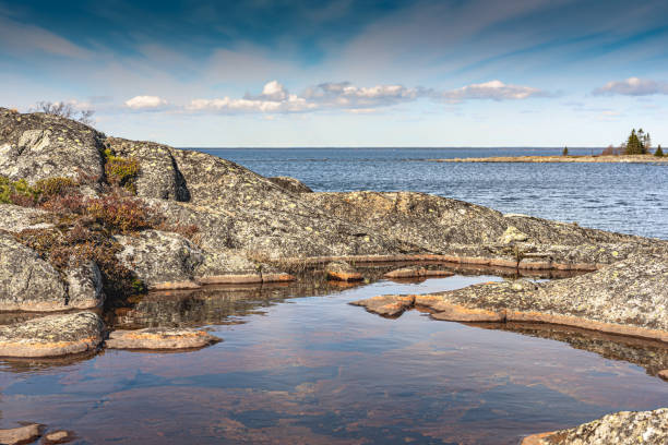 istock Water between rocks by the sea 1460571437