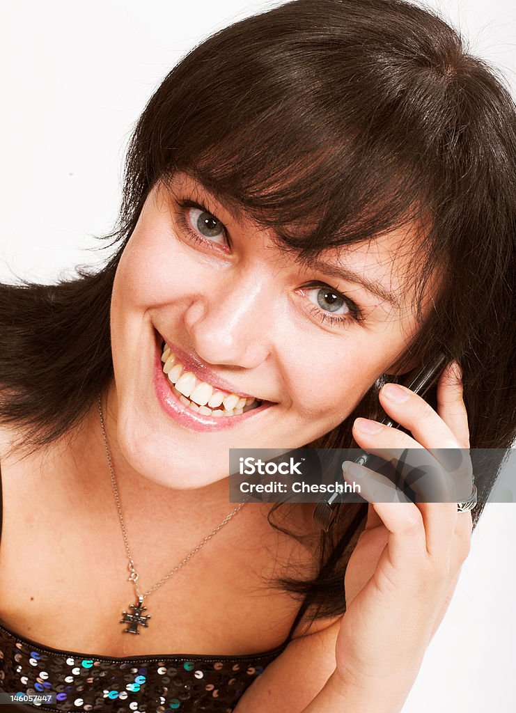 Schöne brunette mit mobile - Lizenzfrei Blau Stock-Foto