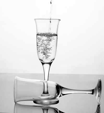 Pouring champagne in glass