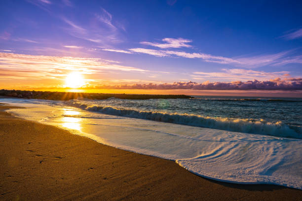 istock Beautiful sunset on the beach and sea with waves, Denmark 1460577483