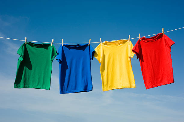 istock Four shirts in primary colors hanging from a clothesline 146058261