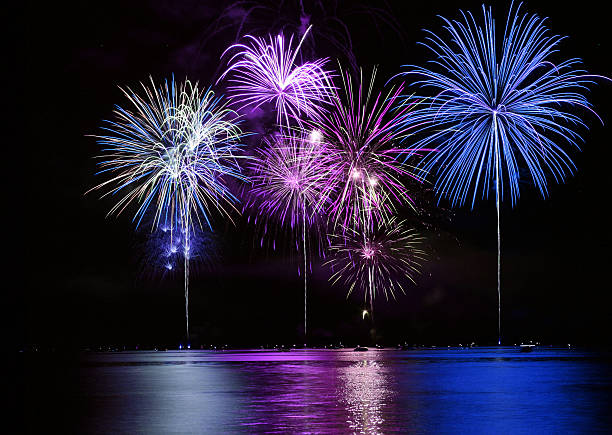 Colorful Fireworks over Lake stock photo