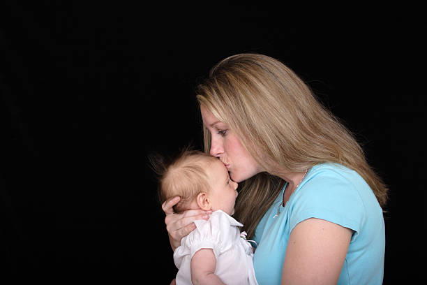 istock Mother Kissing Daughter 146058678