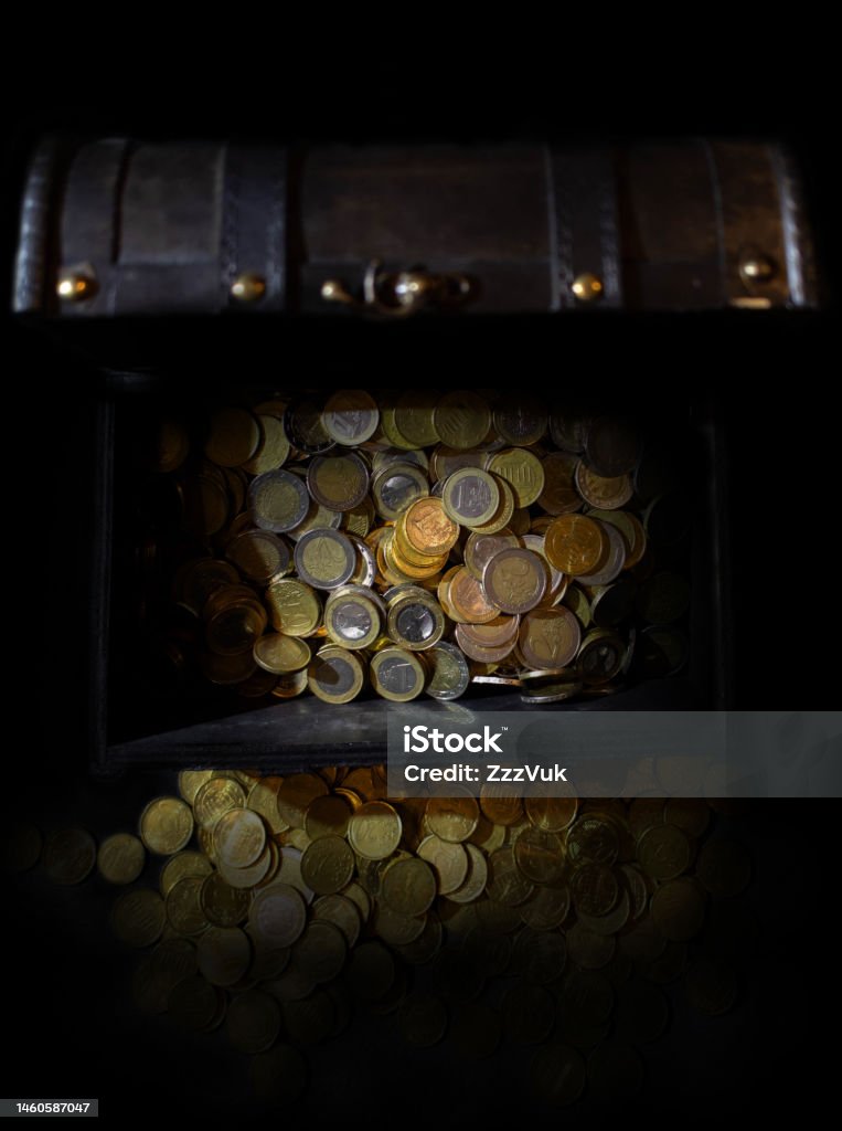 Money Money in and next to the chest. Paper notes and coins of Euro. Banking Stock Photo