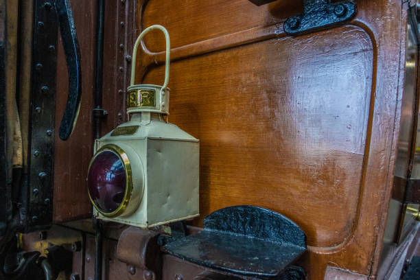 Old lantern hanging on tree branch