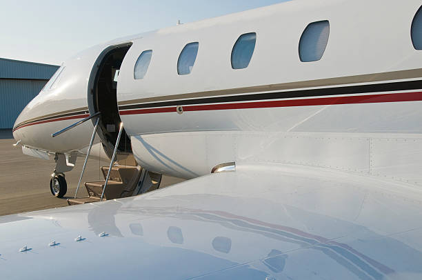 istock Corporate private jet at airport door open 146059043