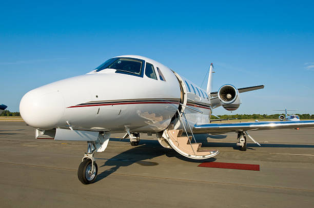 istock Corporate private jet at airport door open 146059073