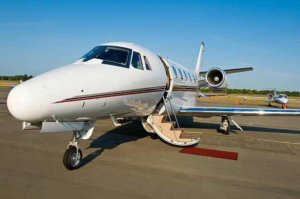 istock Corporate private jet at airport door open 146059081