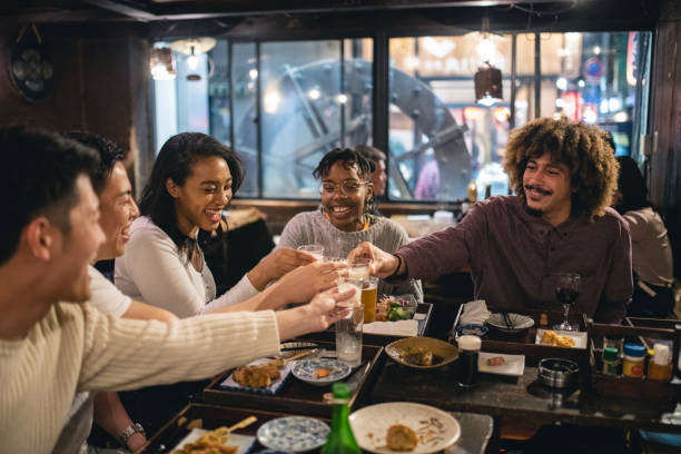 istock Multiracial Coworkers Toasting Together After Work With Refreshing Drinks 1460592288