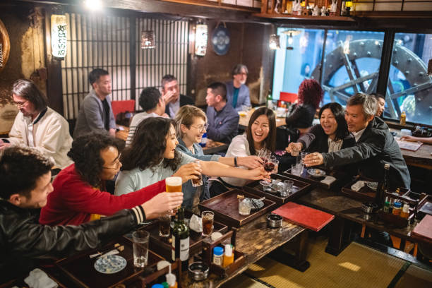 istock Group Of Multiracial Colleagues Toasting Together After Work 1460592820