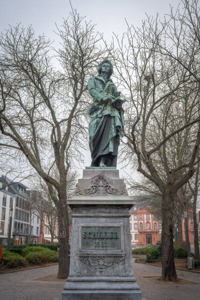 istock Friedrich von Schiller Statue at Schillerplatz Square (by Johann Baptist Scholl, 1862) - Mainz, Germany 1460598382