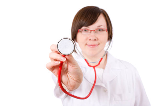 istock female doctor with red stethoscope, isolated 146059849