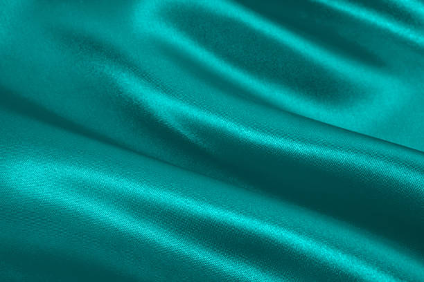 istock Teal green satin background 1460605170
