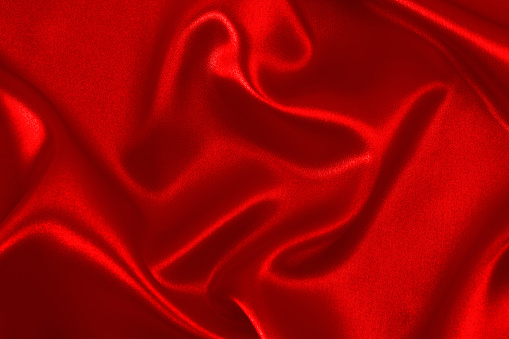 Red satin wavy background.