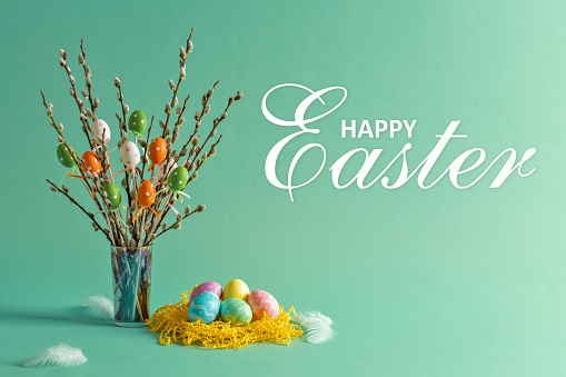 Brown Easter eggs dyed with onion peels with a pattern of fresh leaves in a basket