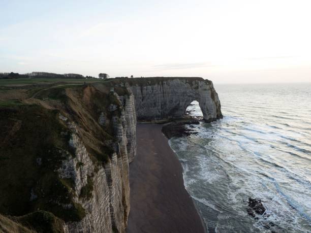 istock Panoramic view of Etretat chalk complex white cliffs natural bridge Aiguille needle atlantic ocean coast Normandy France 1460612771