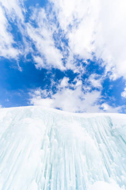 A large wall of frozen icicles on a sunny cold day in North Japan.