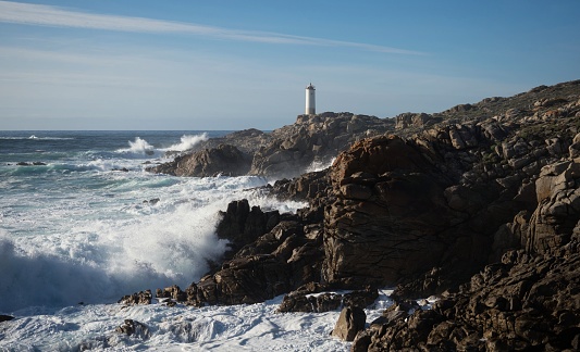 Panoramic view of lighthouse Faro de Cabo Roncudo on Costa da Morte rock coast shore in Ponteceso A Coruna Galicia Spain Europe