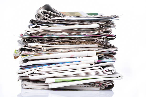 istock Pile of newspapers 146061719