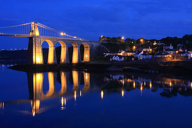 Menai Bridge Menai Bridge linking the Isle of Anglesey conwy castle stock pictures, royalty-free photos & images