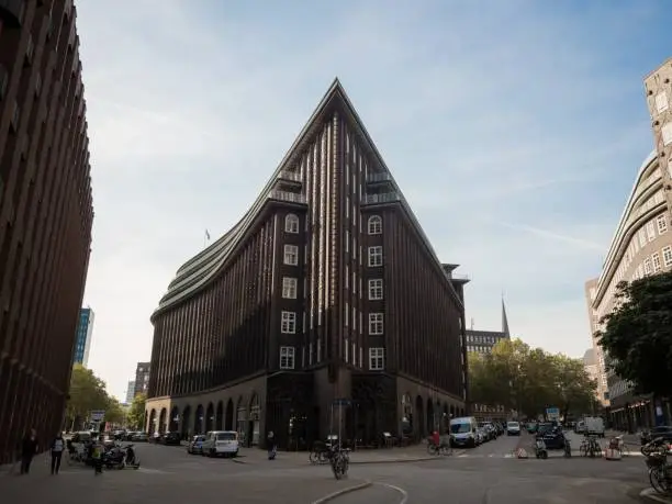 Postcard panorama of Chilehaus Chile House brick expressionism architecture sharp angle ship prow angle perspective symmetry in Speicherstadt warehouse district Kontorhaus Hamburg Germany Europe