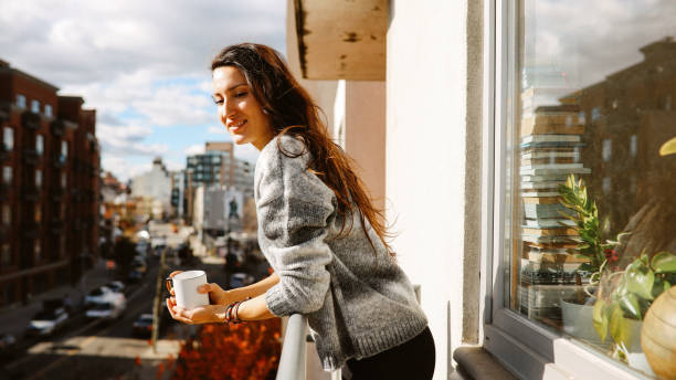 istock relaxing at the NYC balcony at home 1460630421