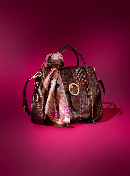 istock Leather handbag and silk scarf 1460632947