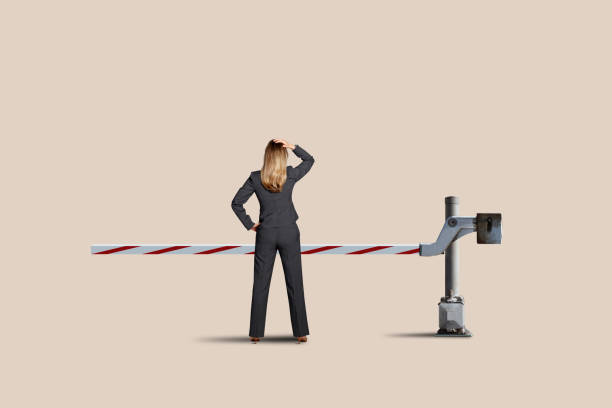 istock Woman Standing At A Roadblock 1460634738