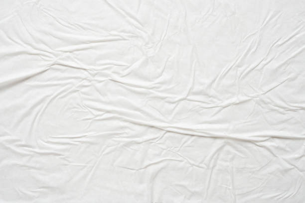 istock white crumpled and creased paper poster texture background 1460645136
