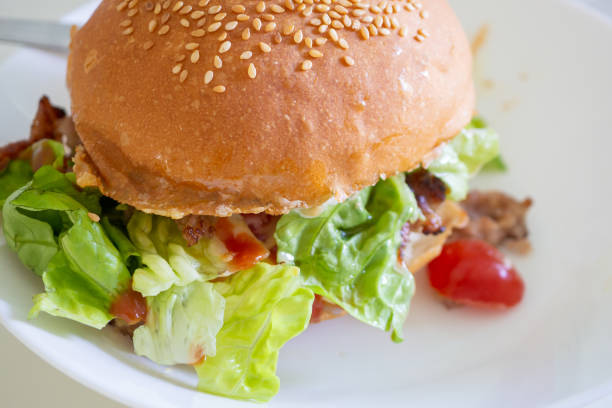 Home made beef hamburger with cheese and vegetables
