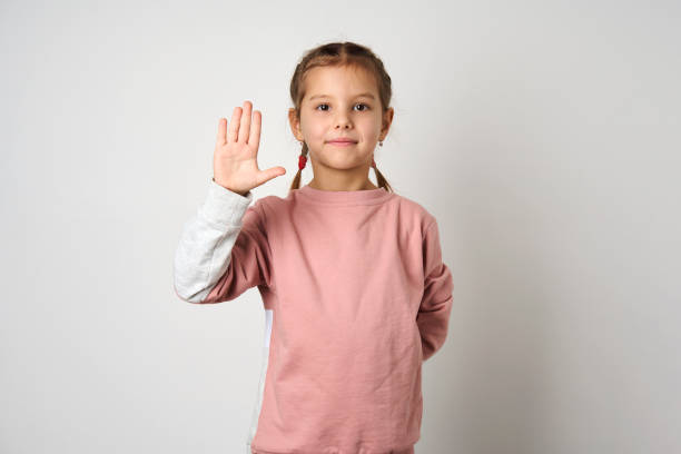 istock Child saying stop with a hand, white background 1460652665