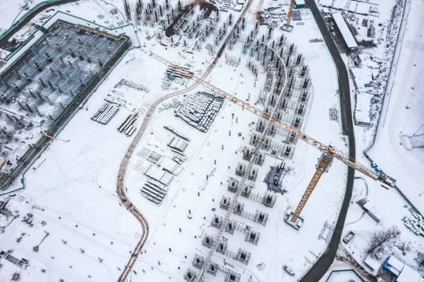 istock construction site from above. foundation of new building covered with snow. aerial view from drone. 1460653670