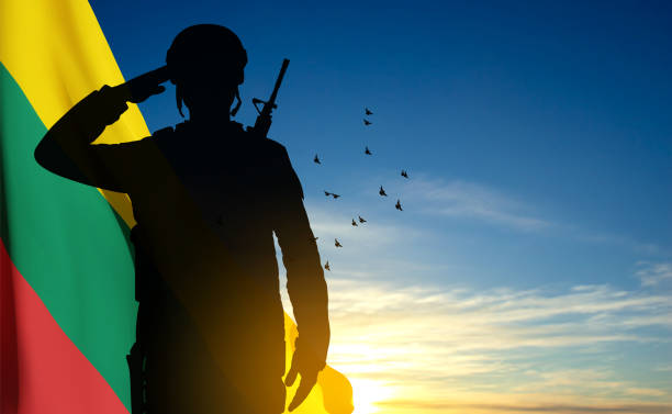 istock Silhouette of soldier with the flag of Lithuania 1460657336