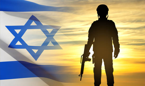 istock Silhouette of soldiers with Israel flag 1460657408
