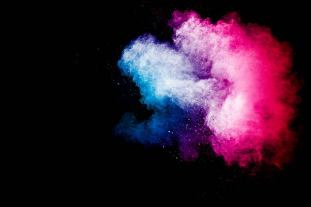 istock Abstract Blue Pink colored sand splash against  black background. 1460661044