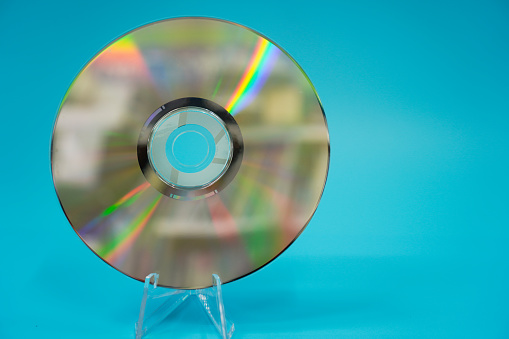 cd or blu-ray disc on white background