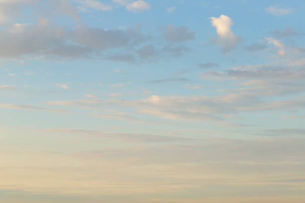 istock sky blue background, fluffy clouds on a summer day in sunlight 1460663954