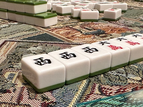 Selected focus for chinese traditional mahjong. The chinese character means the symbol of the game