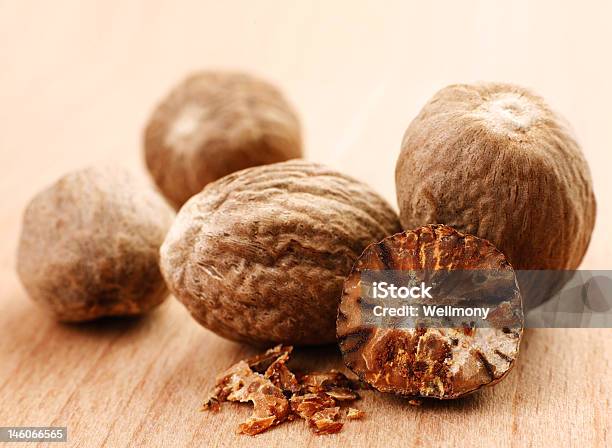 Nutmeg Spice Stock Photo - Download Image Now - Backgrounds, Broken, Brown