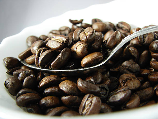 Cтоковое фото Натуральный кофе и кофейных зерен и ложка