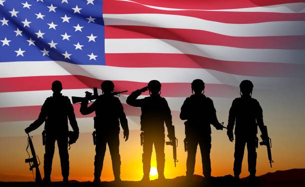 istock Silhouette of army soldier with USA flag 1460666855
