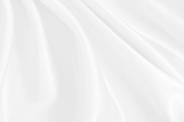 White fabric texture background, detail of silk or linen pattern.