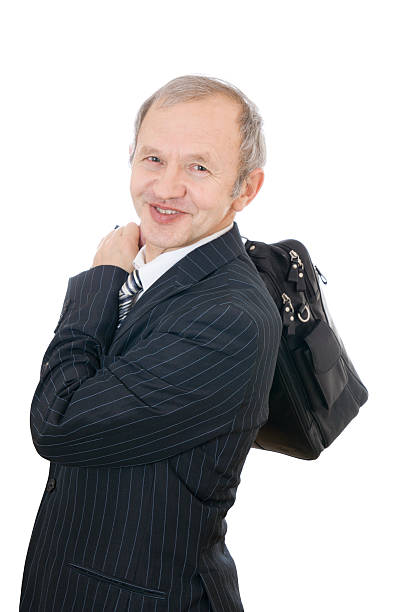 O adulto empresário com um saco isolado - fotografia de stock