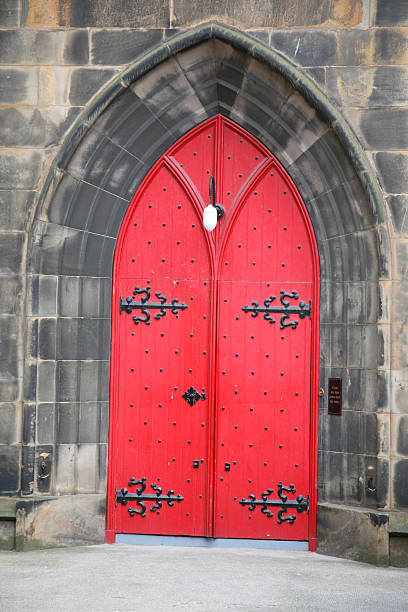 istock Red painted church door 146067772