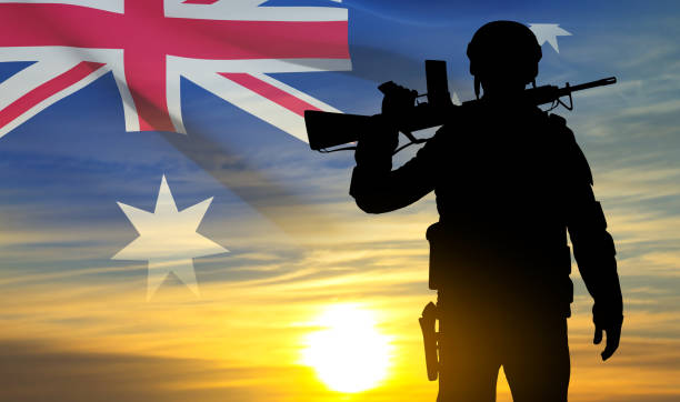 istock Silhouette of Soldier with Australian flag 1460678376