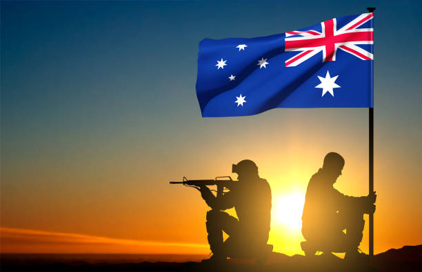 istock Silhouettes of Soldiers with Australian flag 1460680502