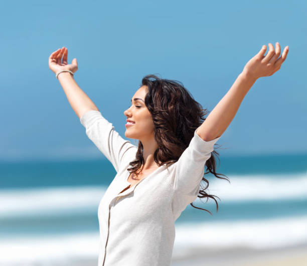 istock Pretty young woman with arms raised 146068566